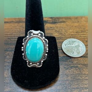 Gorgeous turquoise and sterling stamped adjustable ring.